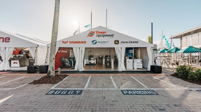 Temporary event environment featuring a branded marquee structure, event pavilion and outdoor corporate activation space.